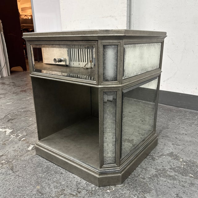 Design Plus Gallery presents an Open Mirrored Nightstand from Restoration Hardware. The nightstand is clad in antiqued...