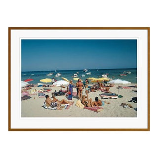Saint-Tropez Beach 1977 by Slim Aarons Brown Framed C-Print For Sale