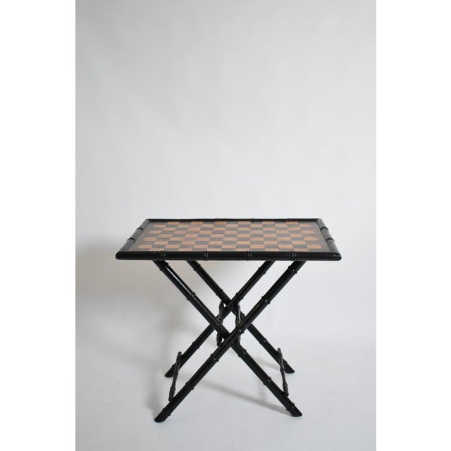 Ebonised wood faux bamboo table, 1960s. Height: 76 cm - 29.92 in Length: 83 cm - 32.68 in Width: 57 cm - 22.44 in