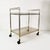 This bar originated in Germany in the 1970s. It features a minimalist, modern design. Made of metal with tinted glass...