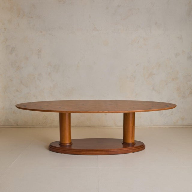 This monumental Italian oval dining table, attributed to Paolo Portoghesi, is the kind of piece designers reach for when a...