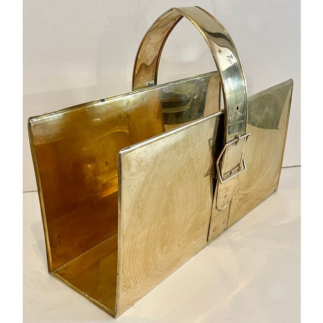 Incredibly chic Italian magazine rack from 70's in the manner of Maria Pergay. Solid brass with belt detail. Large and rare.