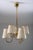 Elegant Swedish Modern chandelier from the 1940s. The lamp features a six-arm brass construction with soft, sweeping...