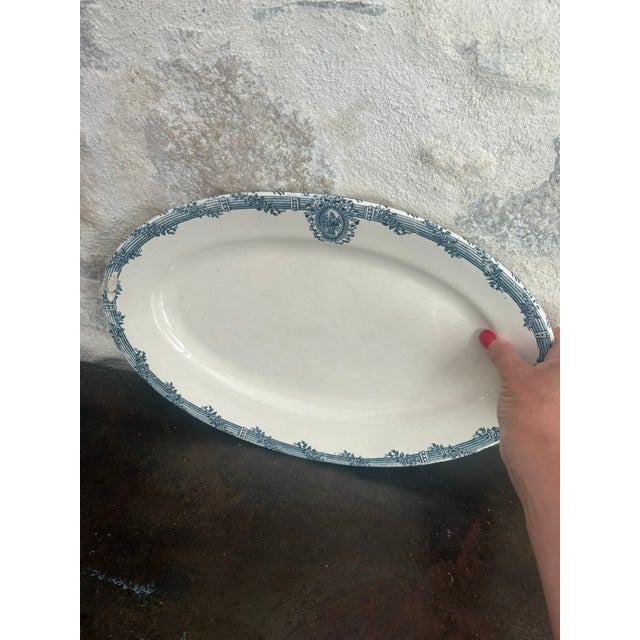 Oval serving platter in blue-and-white "Terre de Fer" (French ironstone), made by the Faïencerie de Salins in Salins-les-...