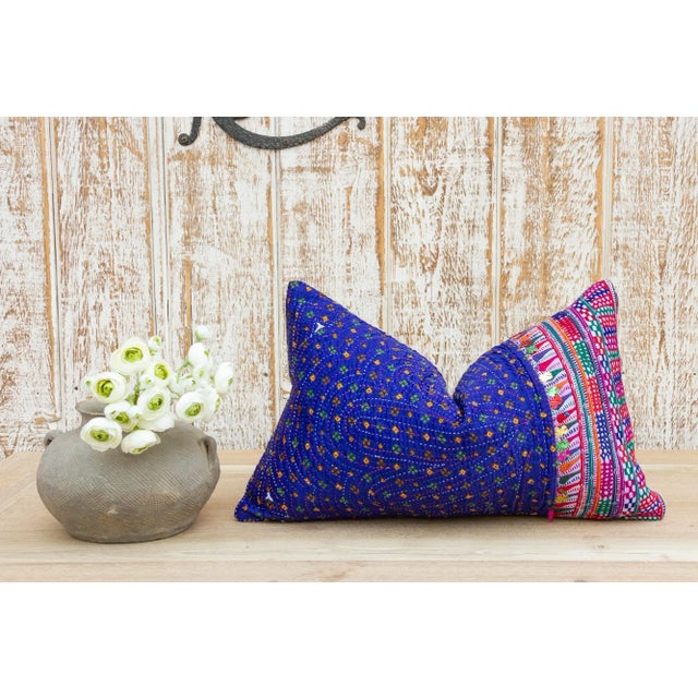 These colorful throw pillows are made from Rabari tribal dowry bags. The embroidery is on cotton and has intricate chain...