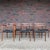 This is a gorgeous set of 6 Danish modern, rosewood and vinyl dining chairs made by J.L. Møller. This Model 79 chair was...