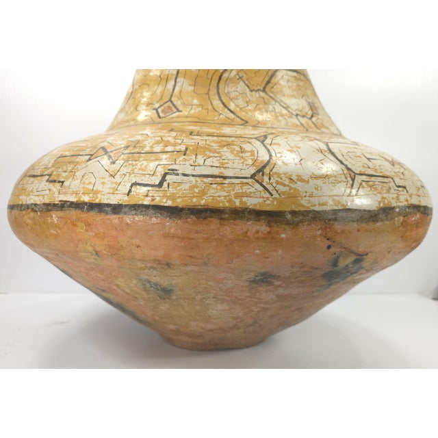 Here's a stunning decorative piece that would be a focal point for any room. This very large handmade Peruvian Clay...