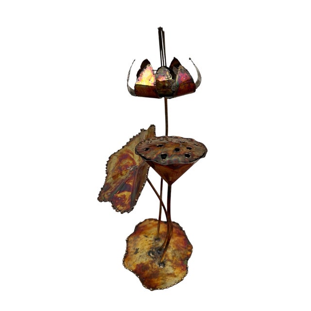 Striking vintage handcrafted metal lotus sculpture featuring a torch-colored iridescent finish, lotus blossom, seed pod,...