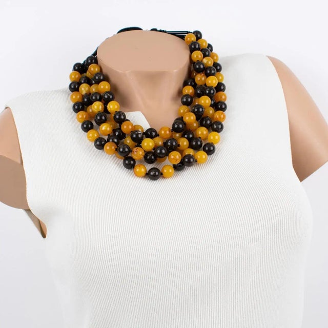 This stunning Angela Caputi resin choker beaded necklace, made in Italy, features a fruit salad multi-strand design with...