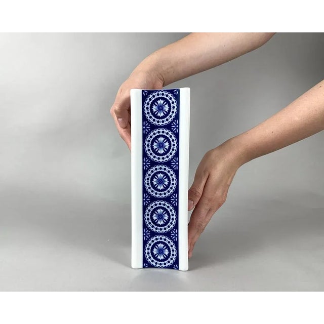 Vintage Porcelain Vase with Blue pattern by Schirnding Bavaria Germany. The vase is made of hand-painted porcelain in...