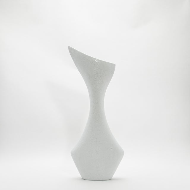 The Bird Vase by R&Y Augousti is a stunning modern sculptural piece, meticulously crafted from luxurious white shagreen....