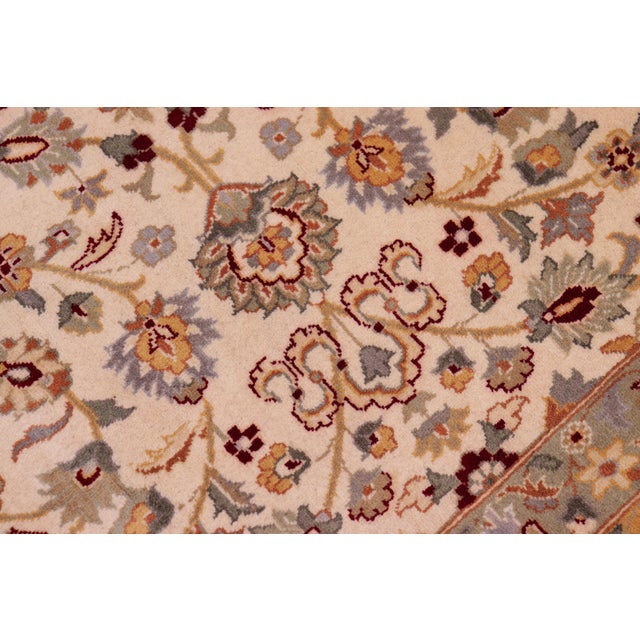 Designed with mesmerizing intricacy and gorgeous color palette, this hand-knotted masterpiece demonstrates the beauty and...