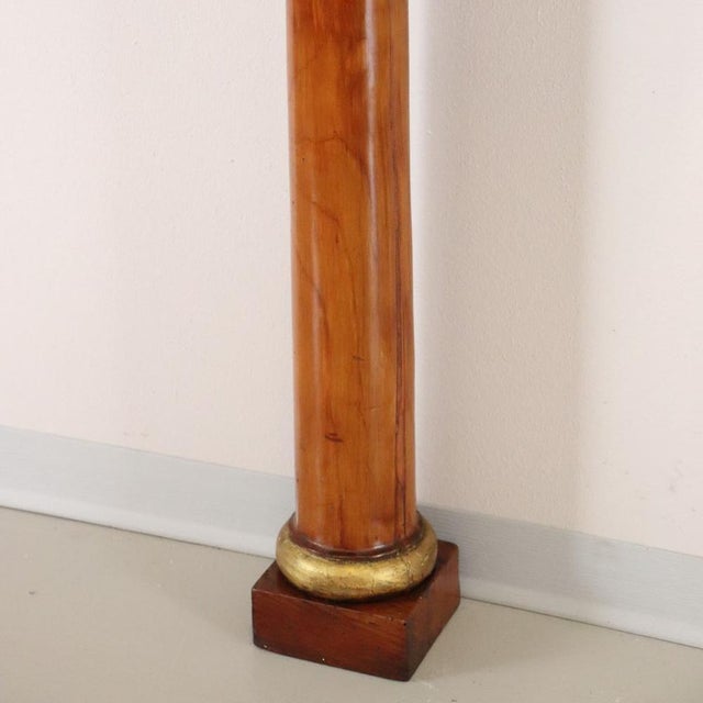 We present this elegant small Italian console table from the Empire period, dating back to the early 19th century. This...