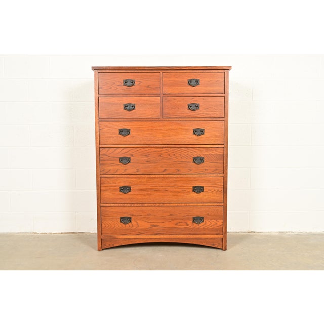 An outstanding Mission or Arts & Crafts style eight-drawer highboy dresser or chest of drawers By Thomasville USA, Late...