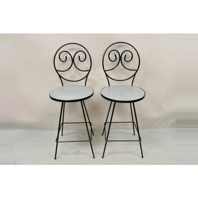 Vintage Mid Century Modern Swivel Seat Arthur Umanoff Style Wrought Iron Counter Barstools - a Pair. Item features swivel...