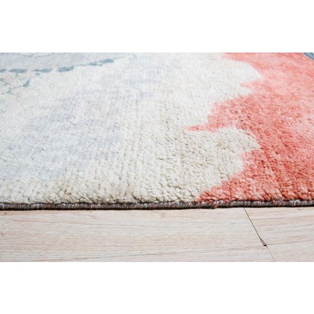 This multicolor jewel tone rug is a hand knotted pile floor covering crafted from high-quality wool. Originating from...