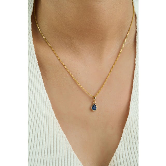 Royal Blue Handcrafted Natural Pear-Cut Blue Sapphire Solitaire Pendant in 14k Yellow Gold For Sale - Image 8 of 15