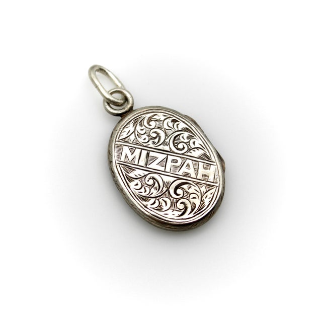 Circa the Victorian era, this sterling silver locket combines beautiful hand engravings and the touching sentiment of the...