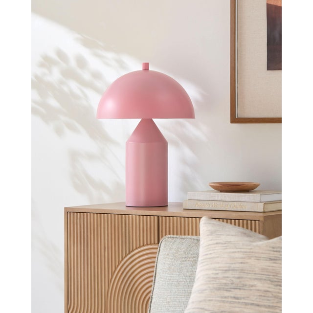 Illuminate your space with the Elder accent table lamp, a striking blend of industrial rustic charm that will captivate...