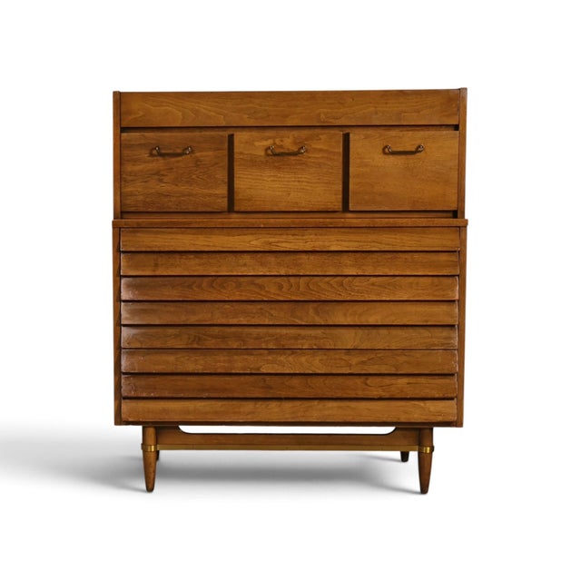This 1960s American of Martinsville highboy dresser from the Dania collection, designed by Merton Gershun, is built around...