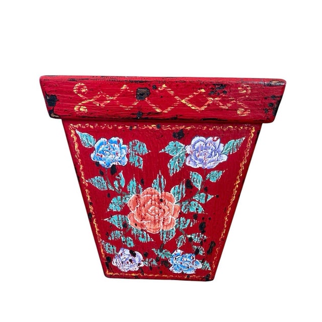 This striking vintage Balinese cachepot features a tapered, square silhouette crafted from wood and finished in a vibrant,...