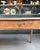 This restored antique farmhouse table captivates with its balanced proportions, simple lines, and the warmth of its light...