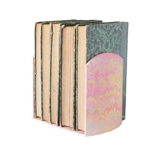 Il Papiro Firenze marbled paper desk set, including a locking storage box with key and a coordinating pair of bookends....