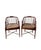 Elevate your living space with this distinguished pair of faux bamboo and cane Regency chairs. Featuring warm reddish-...