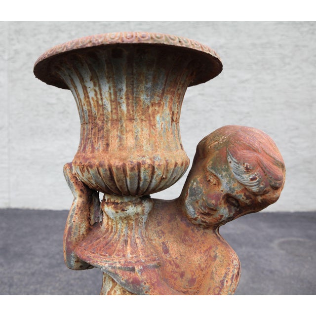 Antique Pair of Cast Iron Garden Statue Planters with Cherubs Holding