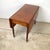A wonderfully appealing drop-leaf table in the classic American Victorian spool-turned manner — the kind of piece that...