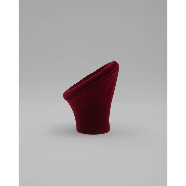 Brown velvet upholstered chair with a wraparound, organic silhouette inspired by the iconic Mushroom Chairs designed by...