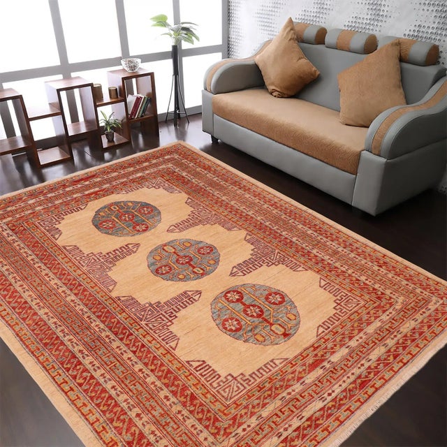 "Enhance the ambiance of your home with this magnificent Persian-influenced Turkish hand-knotted rug made by skilled...