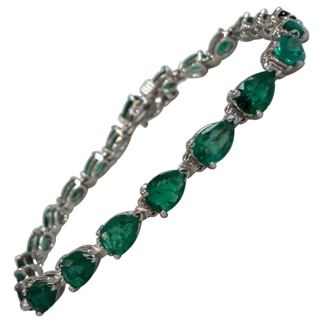 12 Ct Natural Pear Shape Emerald Cocktail Tennis Bracelet 14 Kt White Gold 7" This exceptionally Beautiful Tennis bracelet...