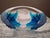 This vintage Lalique “Haiti” mid-20th century tapered ovoid vessel is a fine crystal clear to frosted bowl with vivid...