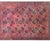 This early 20th-century Afghani Ersari rug is a striking example of tribal craftsmanship, featuring an all-over pattern of...