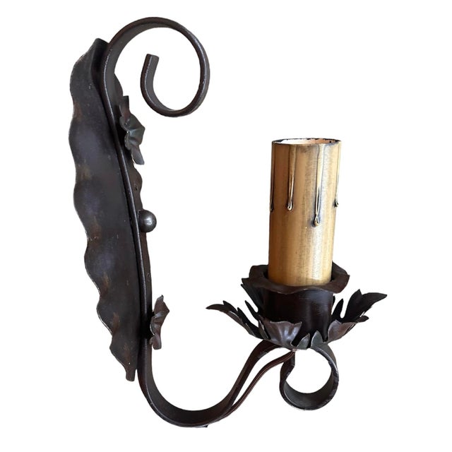 These are charming sconces with the original old paint finish and classic rosettes. Perfect in any location.