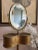 Antique Victorian gentleman’s shaving stand in gilt metal, featuring an adjustable oval mirror above a fitted top with...