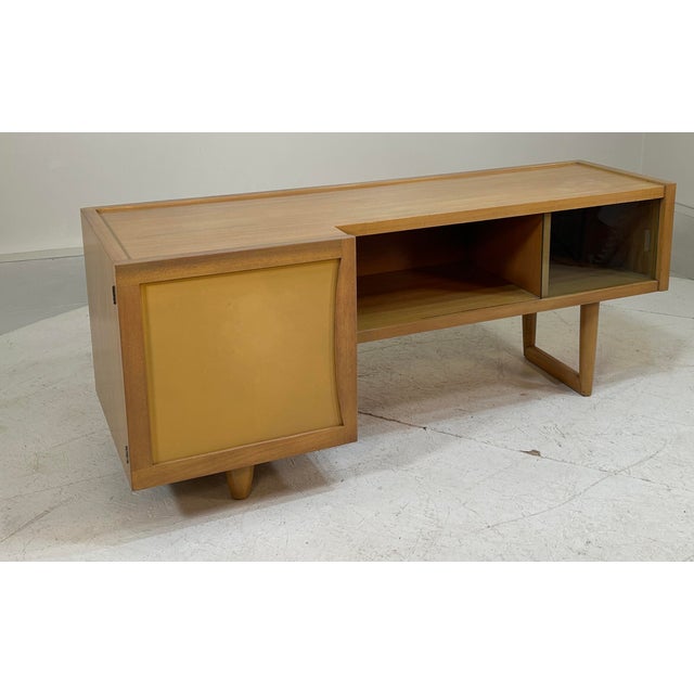 Unsigned. Maker Unknown. Low Profile 24" height, 60" wide and 22" deep at its maximum, otherwise 17". Features a leather...