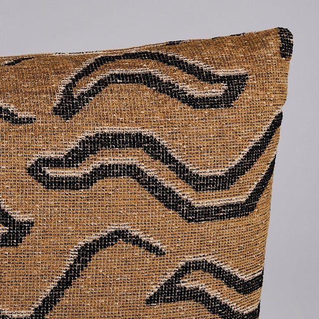 This pillow features Kata with a knife edge finish. An abstract take on a Tibetan tiger pattern, denim-colored Kata is a...