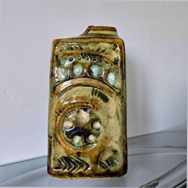 Large size mid century modern ceramic vase by Zsolnay Pecs circa 1980s. The vase has 2 different faces, in olive green and...