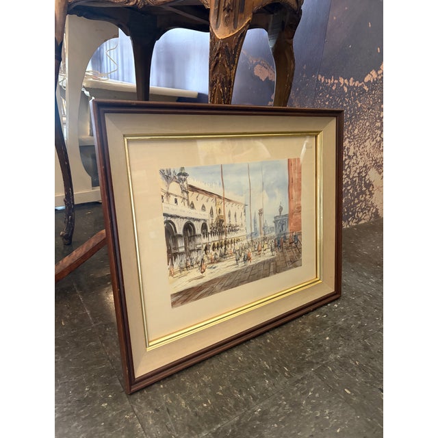 Charming watercolor depicting Piazzo San Marco rendered in a loose atmospheric style with architectural details and...