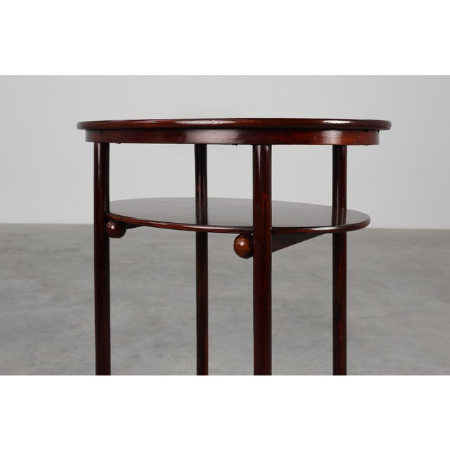 This rare art deco precursor side table designed by josef hoffmann for j. & j. Kohn around 1890 represents an important...