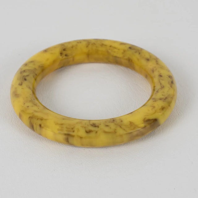 Lovely vanilla and chocolate marble Bakelite bracelet bangle. Chunky tube shape with intense yellow vanilla custard tone...