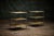 Maison Bagues pair of chinoiserie three-tier side tables with faux bamboo gilt metal legs and painted tole trays. The...