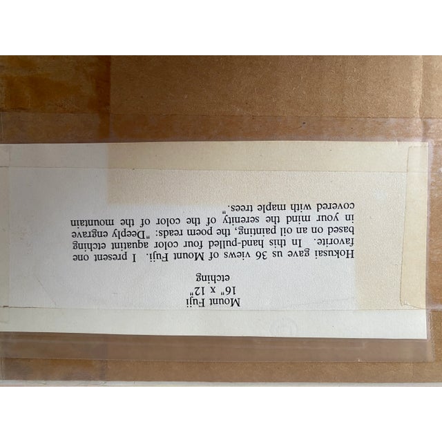 This hand-pulled, four-color aquatint etching is based on an oil painting inspired by a view of Mt. Fuji by Hoikusai, one...