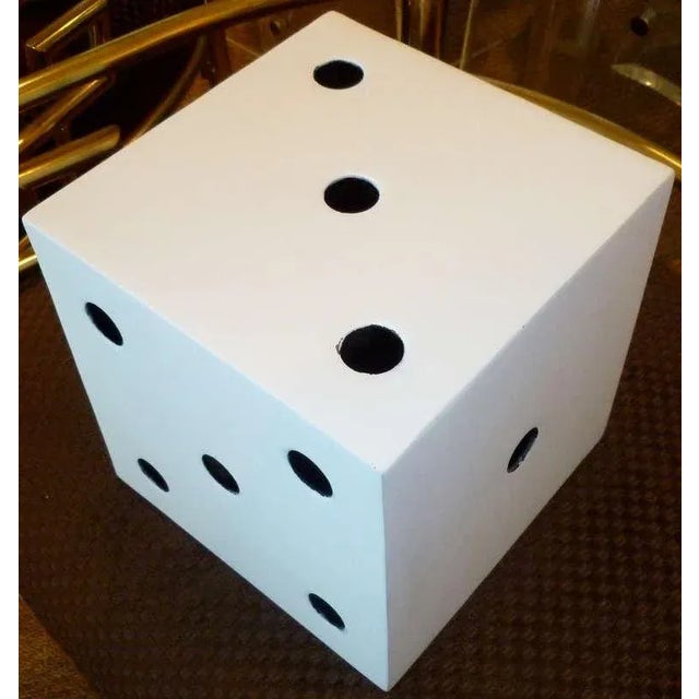 White on the outside/black on the inside... all the different sides with different holes on this dice. very heavy,...