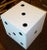 White on the outside/black on the inside... all the different sides with different holes on this dice. very heavy,...