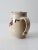 This is a vintage Lakeside Pottery pitcher. Signed by the artist, the handmade studio pottery ewer features a creamy beige...
