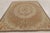 Handmade in wool, this 9x11 antique hooked rug dates to circa 1920-1930. The design features an elegant floral wreath...