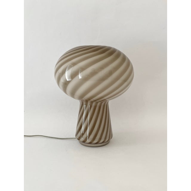 Table lamp in authentic murano glass, hand-blown using the ancient murano swirl technique, designed by ettore...